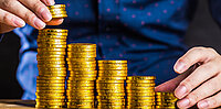 Reicher Mann mit Goldmünzen