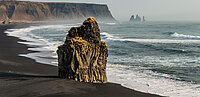 EinFlesen an einem Meeresstrand